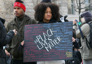 Illustration for article titled The Signs of Protest From the Justice for All March